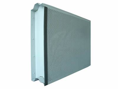 A piece of perforated aluminum sound barrier with even surface.