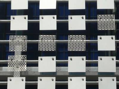 There are some square metal plate which some of them have small holes.